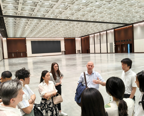Members of the PCST delegation tour the proposed venue for PCST 2027.